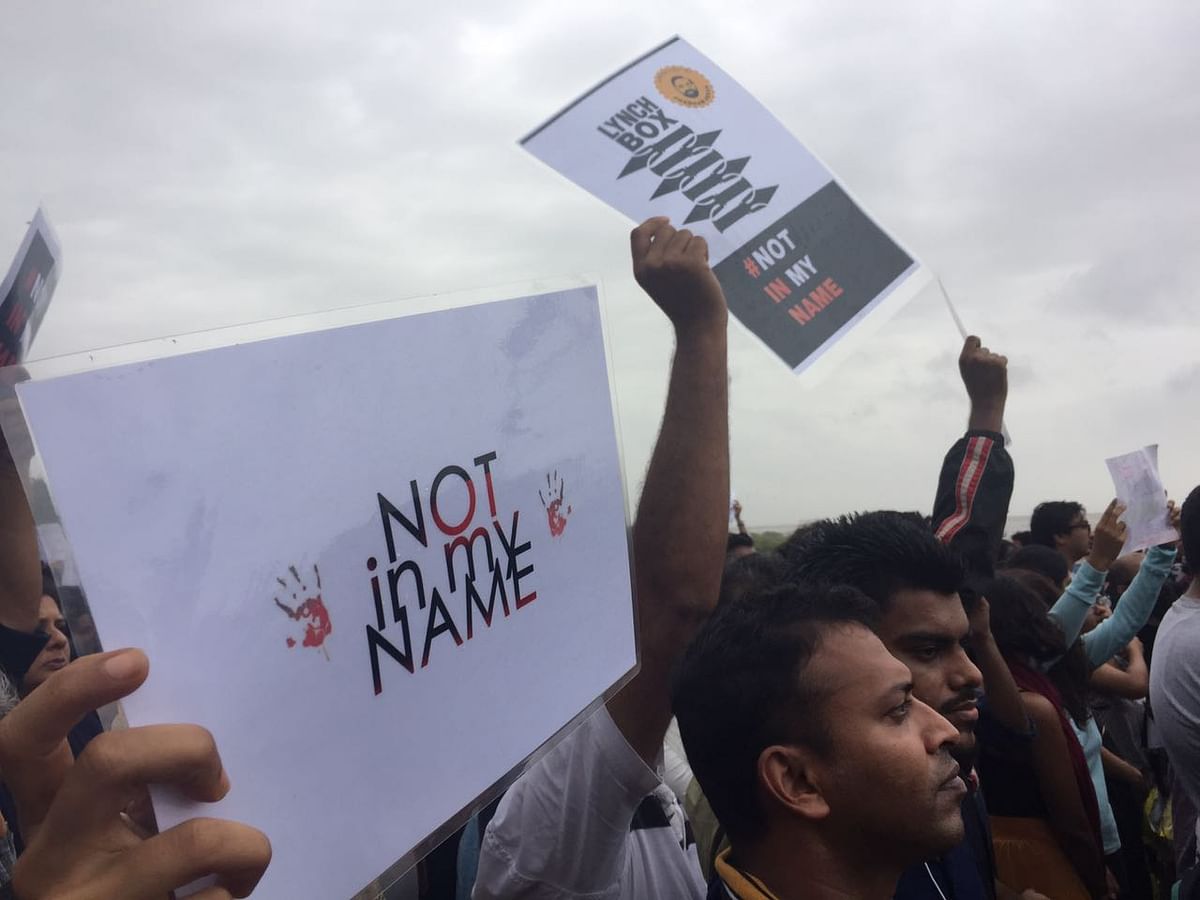 A glimpse at #NotInMyName protest through pictures.