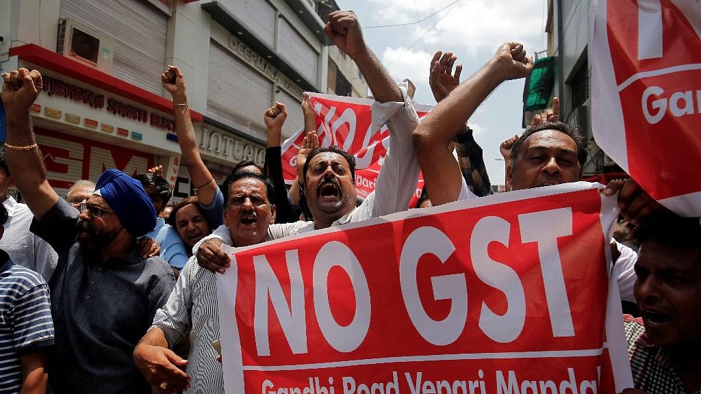 Traders shout slogans during a day-long strike against GST in Ahmedabad. (Photo: Reuters)&nbsp;