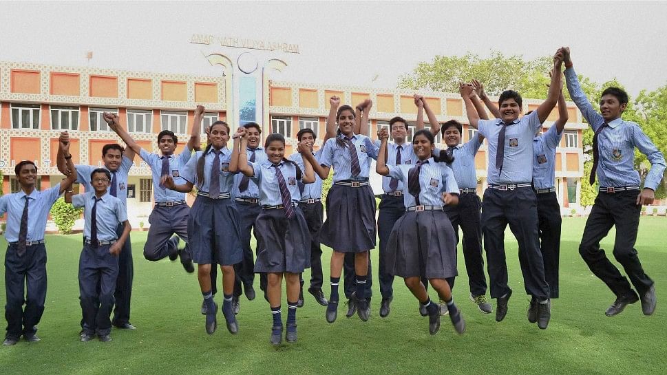 File photo of students celebrating after declaration of CBSE Class X results. (Photo:PTI) &nbsp;
