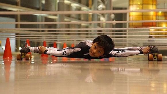Limbo skating prodigy Tiluck Keisam broke his own world record in May. (Photo Courtesy: <a href="http://www.guinnessworldrecords.com/news/2017/5/indias-eight-year-old-limbo-skating-sensation-glides-into-the-record-books-470089">Guinness World Records</a>)