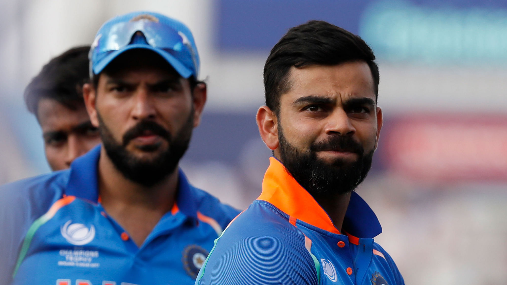 Captain Virat Kohli with teammate Yuvraj Singh after India lost the Champions Trophy final. (Photo: AP)