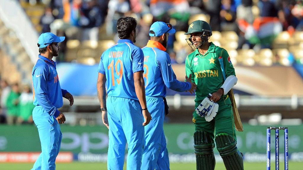 Indian cricket captain Virat Kohli shakes hand with Pakistan’s Shadab Khan .