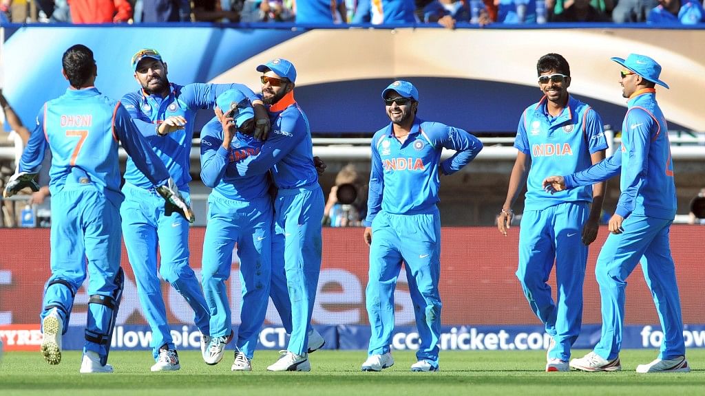 

Indian team after the celebrating dismissal of Pakistan’s Shoaib Malik during the ICC Champions Trophy (Photo: AP)&nbsp;