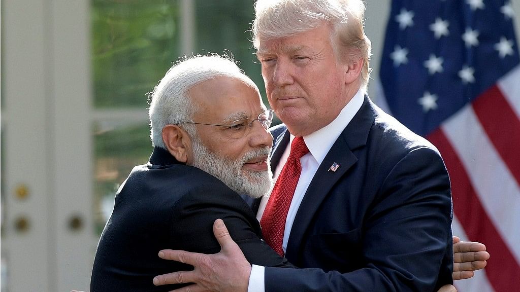 President Donald Trump and Indian Prime Minister Narendra Modi hug during their meeting in the Rose Garden of the White House in Washington on Monday.