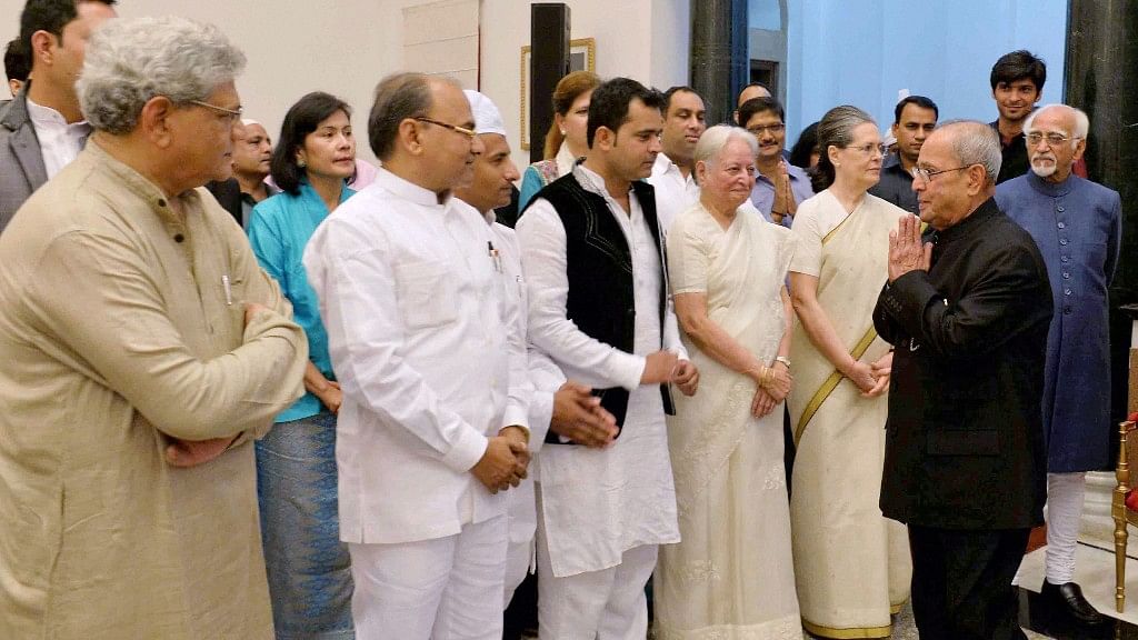 President Pranab Mukherjee greets political leaders and others at an Iftar party hosted  at the Rashtrapati Bhawan in New Delhi on Friday. (Photo: PTI)