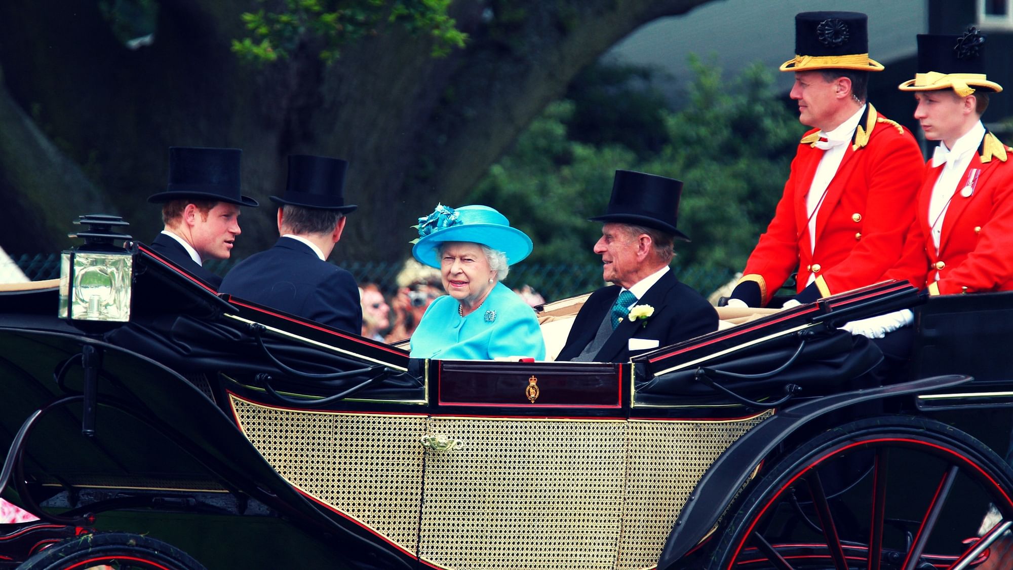 The Queen is never happier than when watching ‘the sport of kings’ (especially when one of her horses wins!). (Photo Courtesy: Shutterstock)