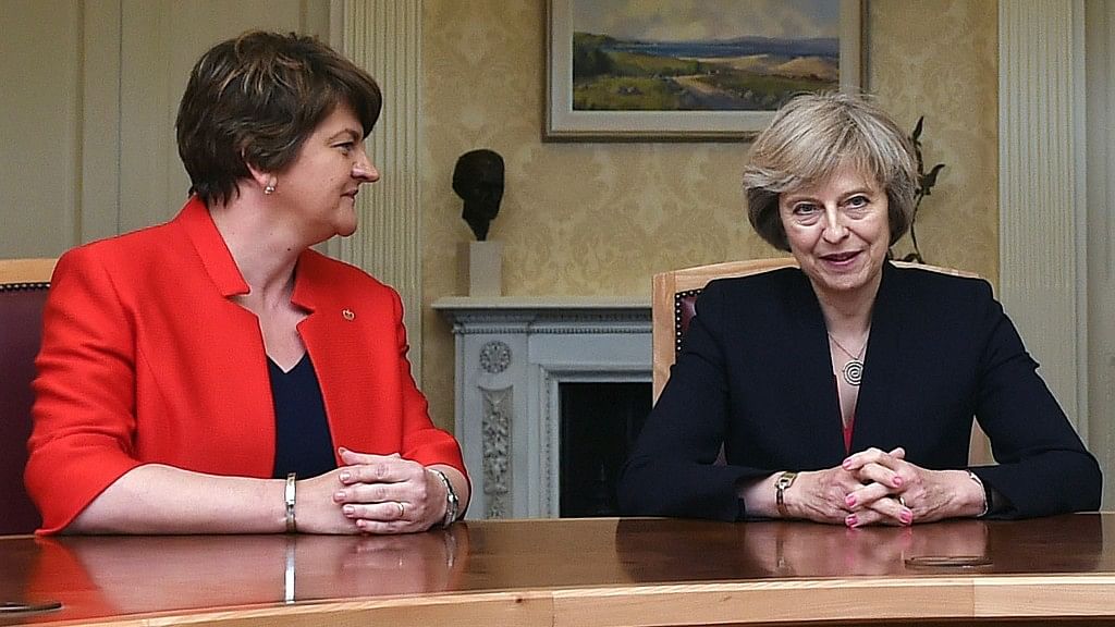 File photo of  Arlene Foster, left, leader of the Democratic Unionist Party, with Britain’s Prime Minister Theresa May. (Photo: AP)
