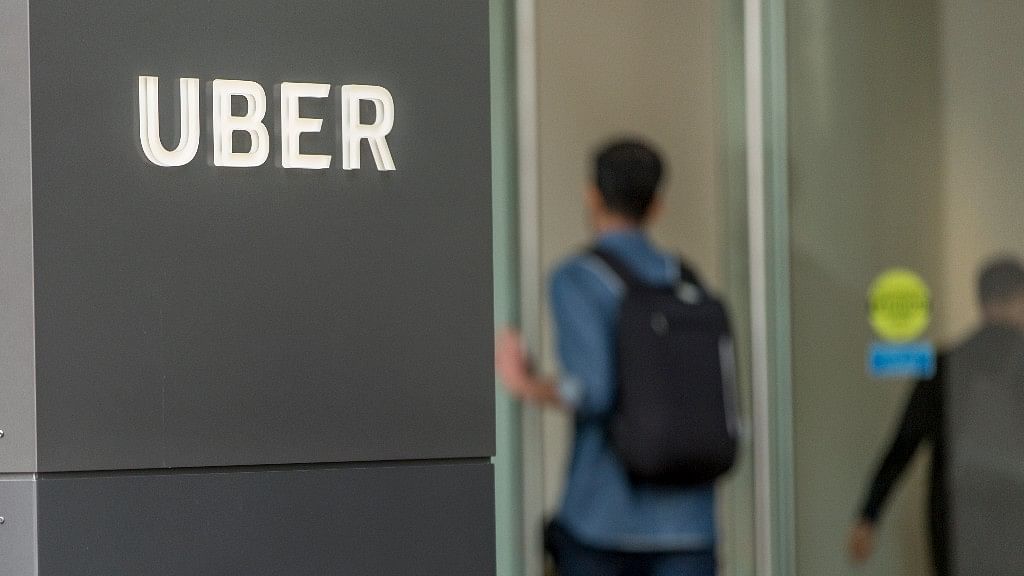 Outside the headquarters of the ride-sharing company Uber, located at 1455 Market St in San Francisco.