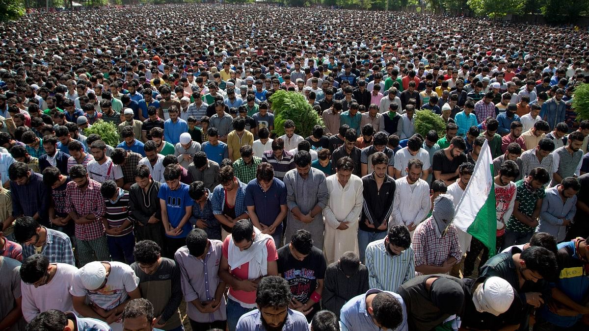 Villagers pray during the funeral of Burhan Wani, in Tral, some 38 kilometers south of Srinagar, Kashmir. Image used for representation. (Photo: AP)