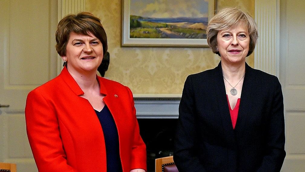 North Ireland’s Democratic Unionist Party leader Arlene Foster (left) with Theresa May. (Photo: AP File Photo/Charles McQuillan)