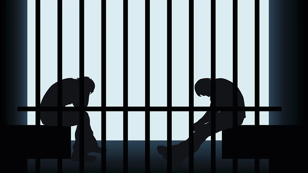 Representational image of jail and inmates.