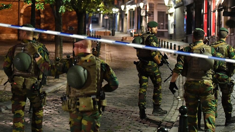 Belgian Army soldiers patrol near Central Station in Brussels after the attack.