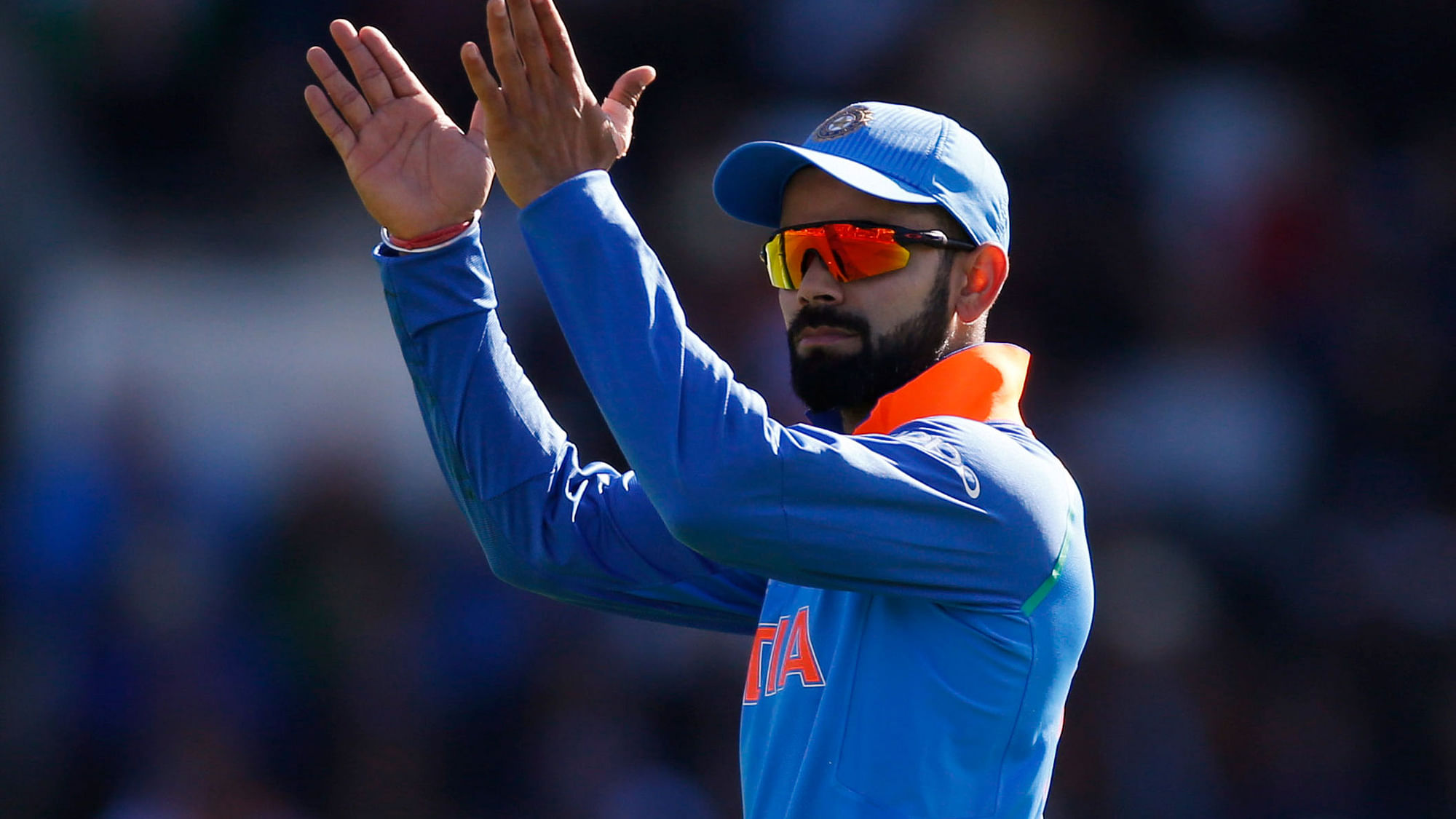 Virat Kohli gestures during the match between India and Pakistan on Sunday. (Photo: Reuters)
