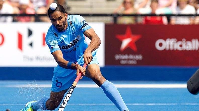 Indian Hockey players wore black armbands in a match against Pakistan. (Photo: Hockey India)