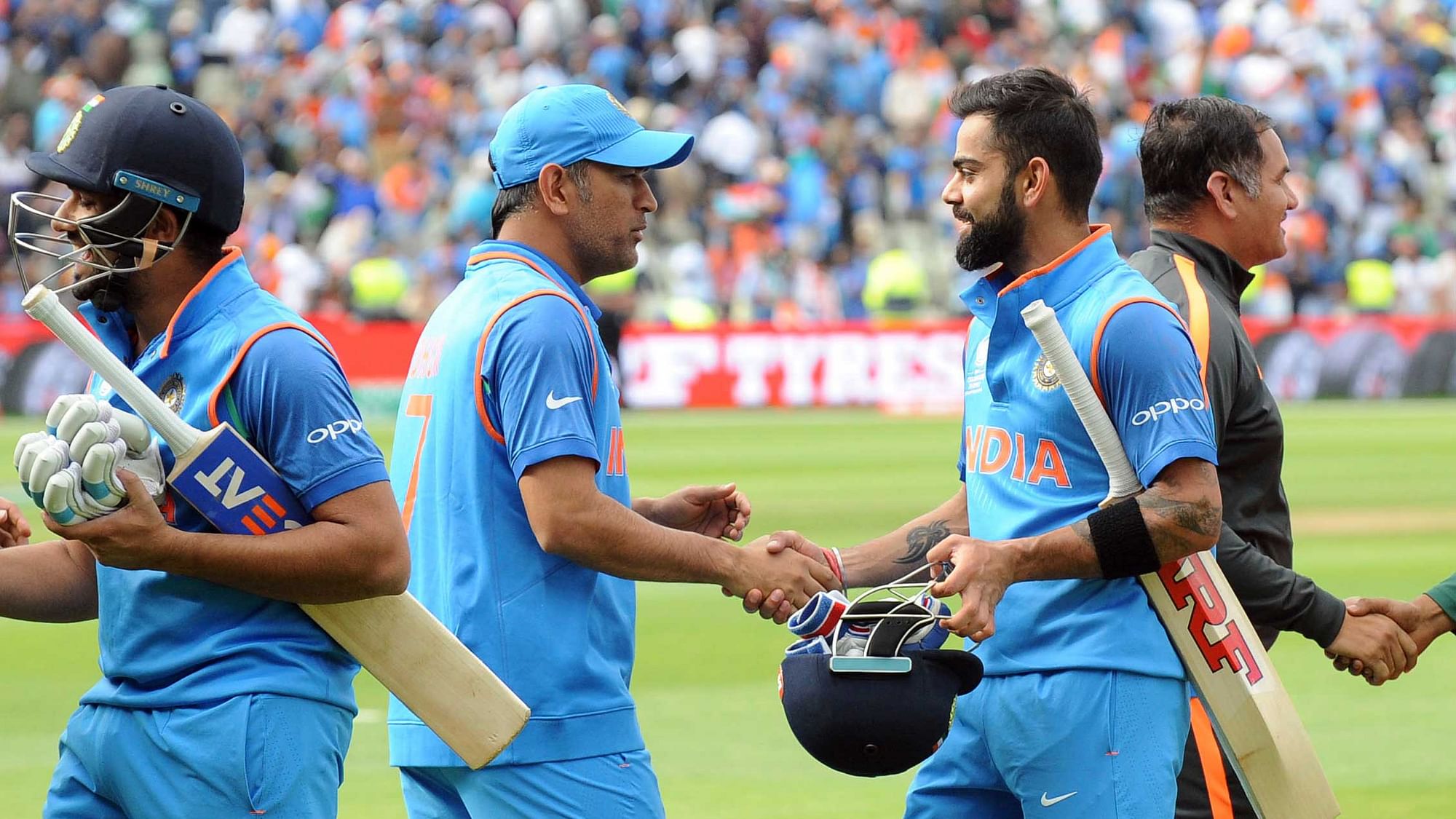 India and Bangladesh players shake hands at the end of the ICC Champions Trophy semifinal match between Bangladesh and India at Edgbaston in Birmingham. (Photo: AP)
