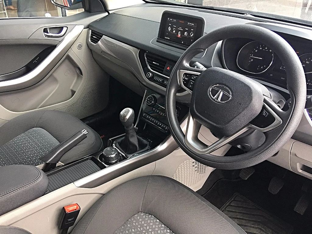 The interiors of the Tata Nexon are done up in beige and black. 