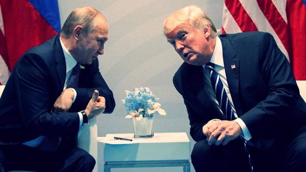 Putin meeting Trump. (Photo: AP)