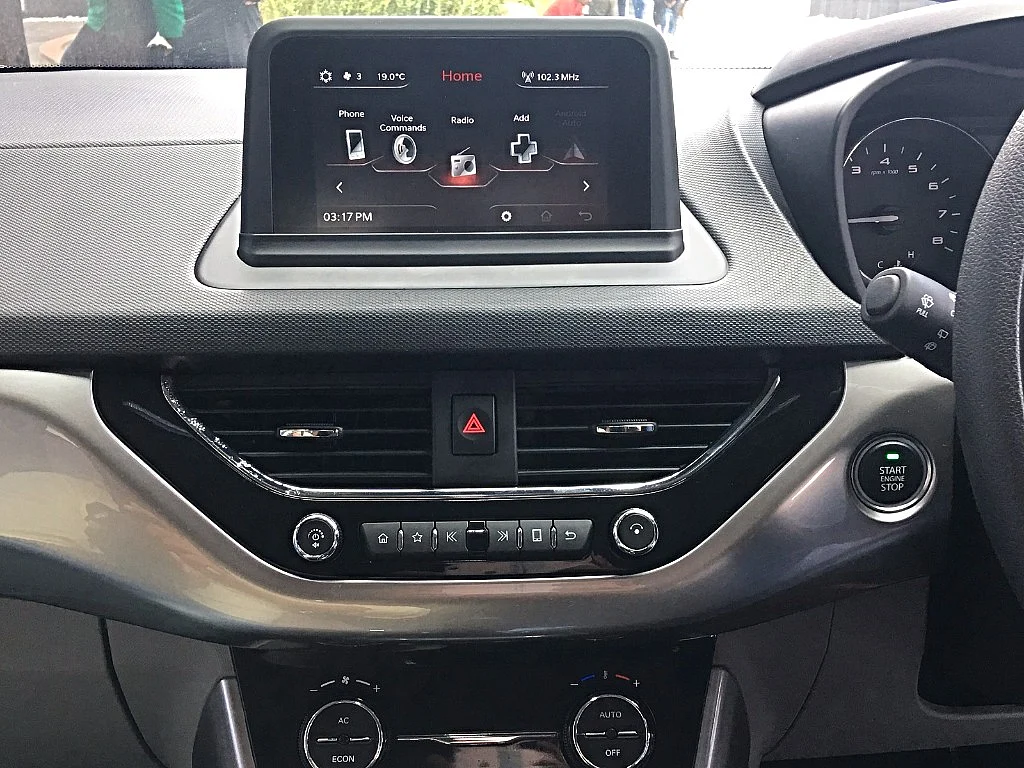 The Harman infotainment system with its 6.5-inch touchscreen dominates the dashboard. 