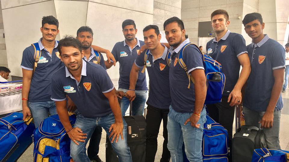 Dabang Delhi players collect at the airport before departing for Hyderabad, the venue of Pro Kabaddi’s opening ceremony.