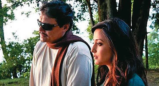 Saswata Chatterjee and Raima Sen in a still from <i>C/O Sir</i>.