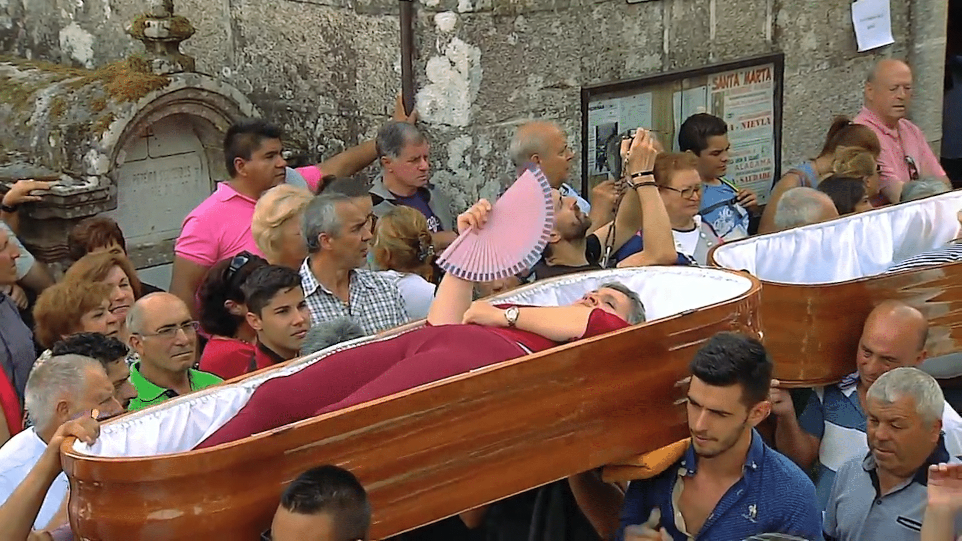 Living people carried in coffins during the Santa Marta pilgrimage