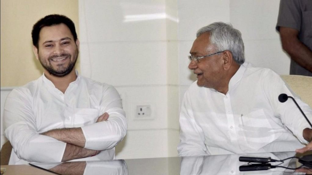 A file image of Nitish Kumar (right) and Tejashwi Yadav. (Photo: PTI)
