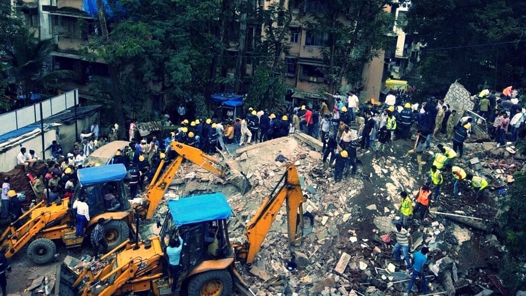 A residential building collapses in Ghatkopar. (Photo: IANS)
