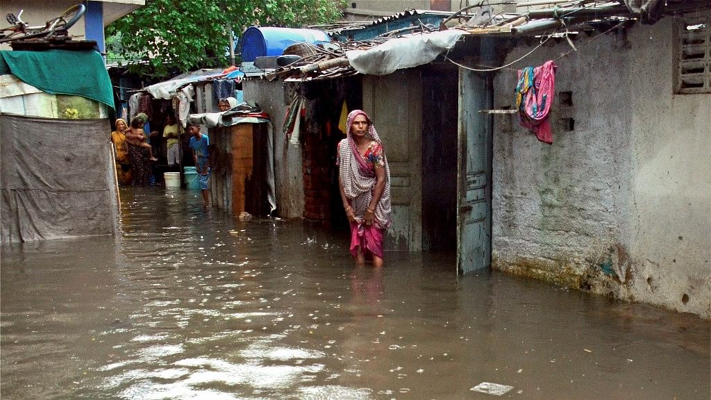 Water-logged houses at a slum area after heavy monsoon rains.