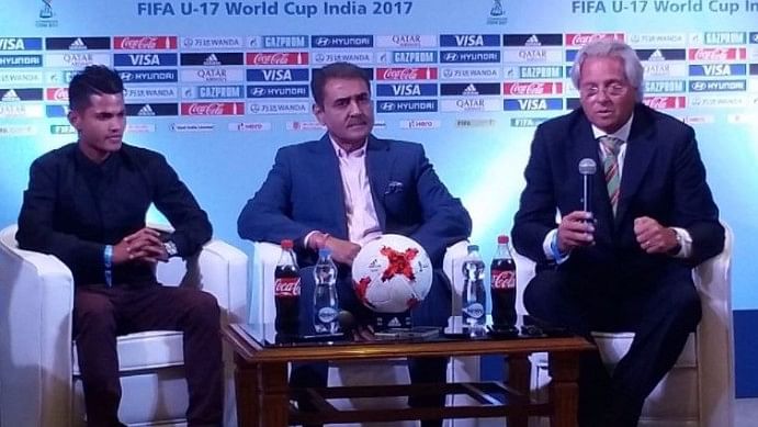 AIFF President Praful Patel addresses the media with Luis Matos and Sanjeev Stalin moments after the U-17 World Cup draw. (Photo Courtesy: Twitter/<a href="https://twitter.com/IndianFootball">Indian Football Team</a>)
