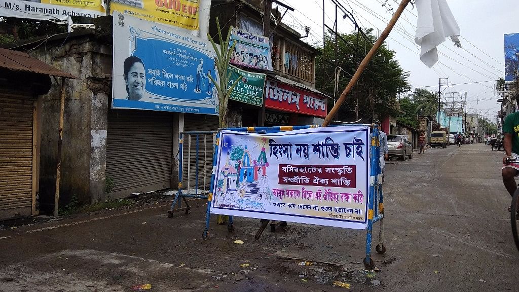 Posters in Basirhat town proclaiming inter-community harmony.  &nbsp;