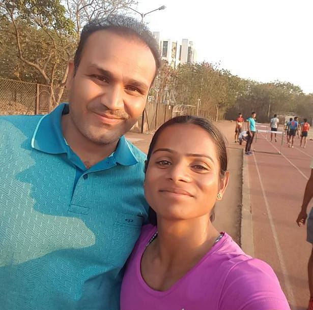 Dutee Chand clicks a selfie with former India opener Virender Sehwag.