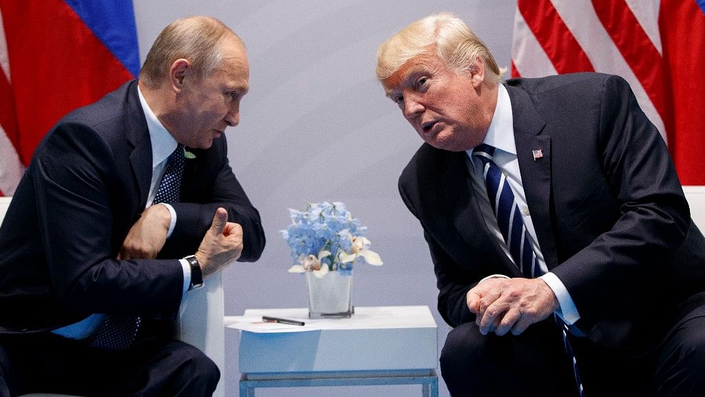 US President Donald Trump and Russian President Vladimir Putin during their first face-to-face meeting on Friday.&nbsp;