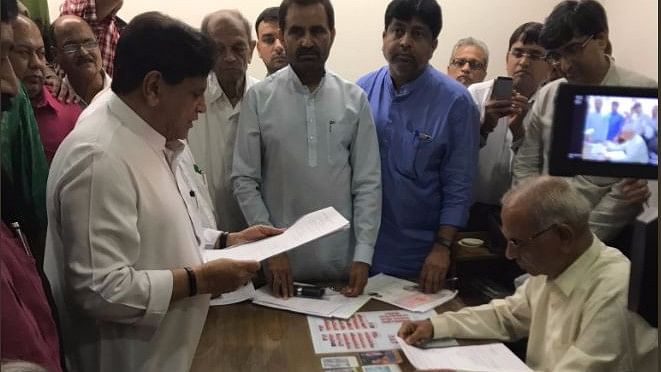Congress senior leader Ahmed Patel files his nomination for the Rajya Sabha polls to be held on 8 August.&nbsp;