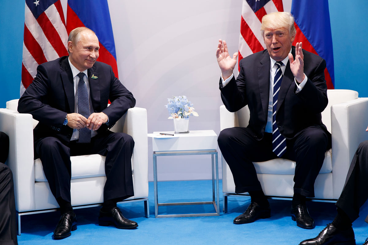 In their first face-to-face encounter, Putin told Trump that he was “delighted” to meet him personally.