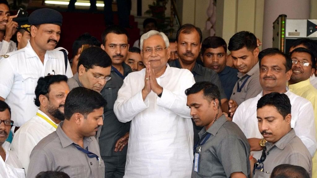 

Bihar Chief Minister Nitish Kumar comes out of the state assembly after winning the trust vote in Patna on 28 July.