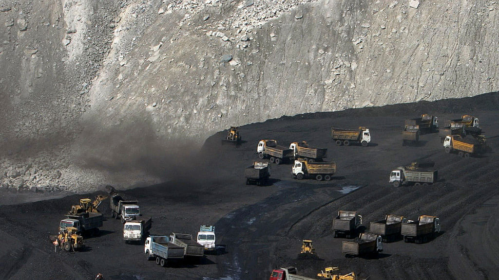 Miners work at the Gevra coal mines in the central Indian state of Chhattisgarh, Asia’s largest opencast coal mine, 21 November 2009.&nbsp;