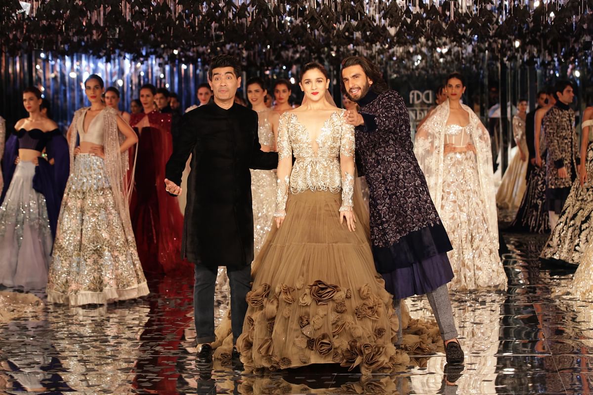 Alia Bhatt and Ranveer Singh walked the ramp for Manish Malhotra at India Couture Week.