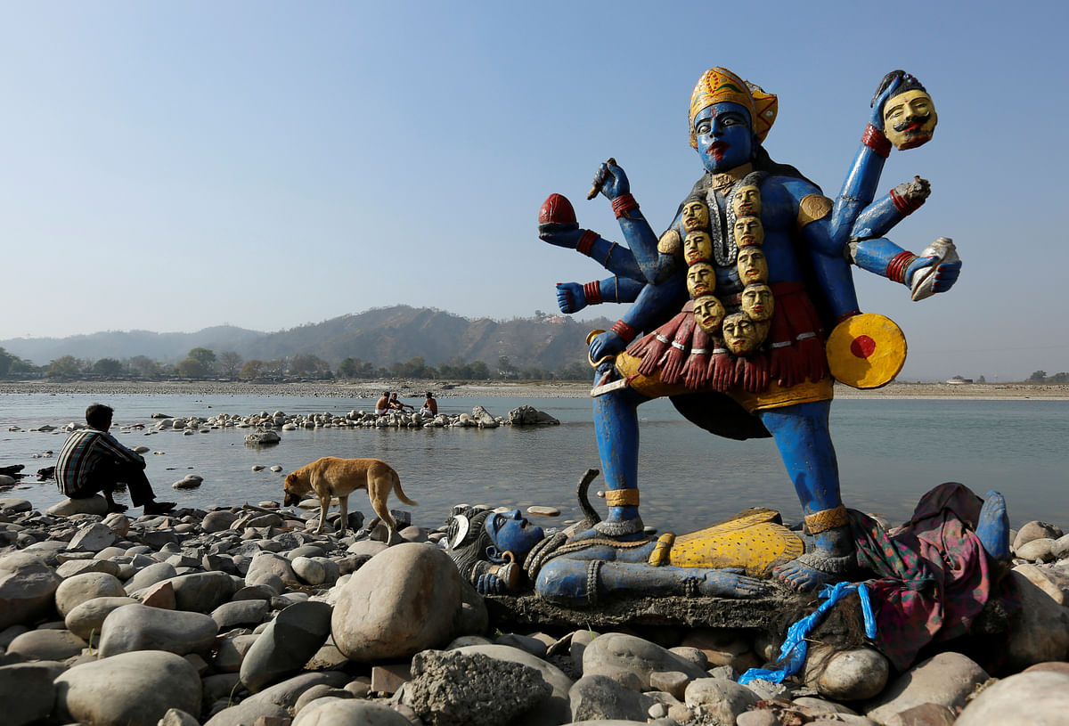 Thousands of Indians immerse themselves and idols of their gods every day in the river Ganga. 
