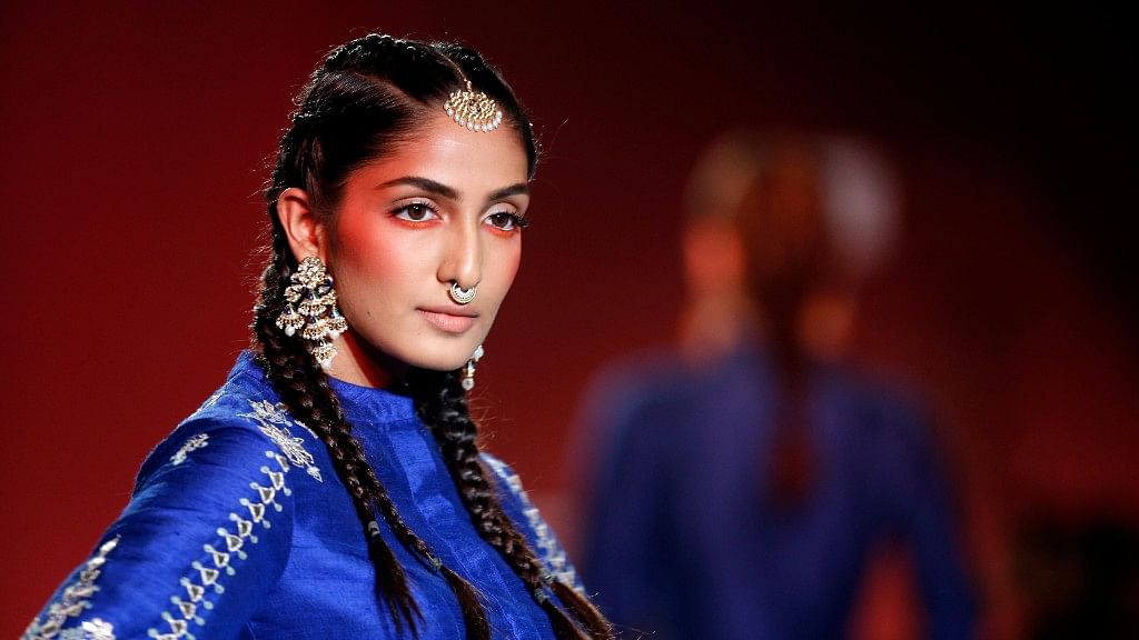 

A model displays a design by Anita Dongre at the India Couture Week 2016.