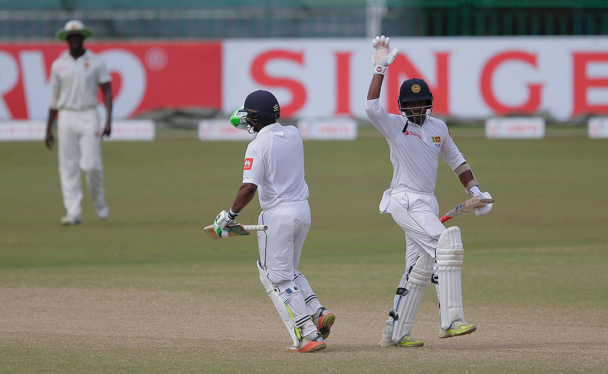 Dickwella and Gunaratne hit crucial half centuries to guide Sri Lanka to their highest-ever run chase at home.