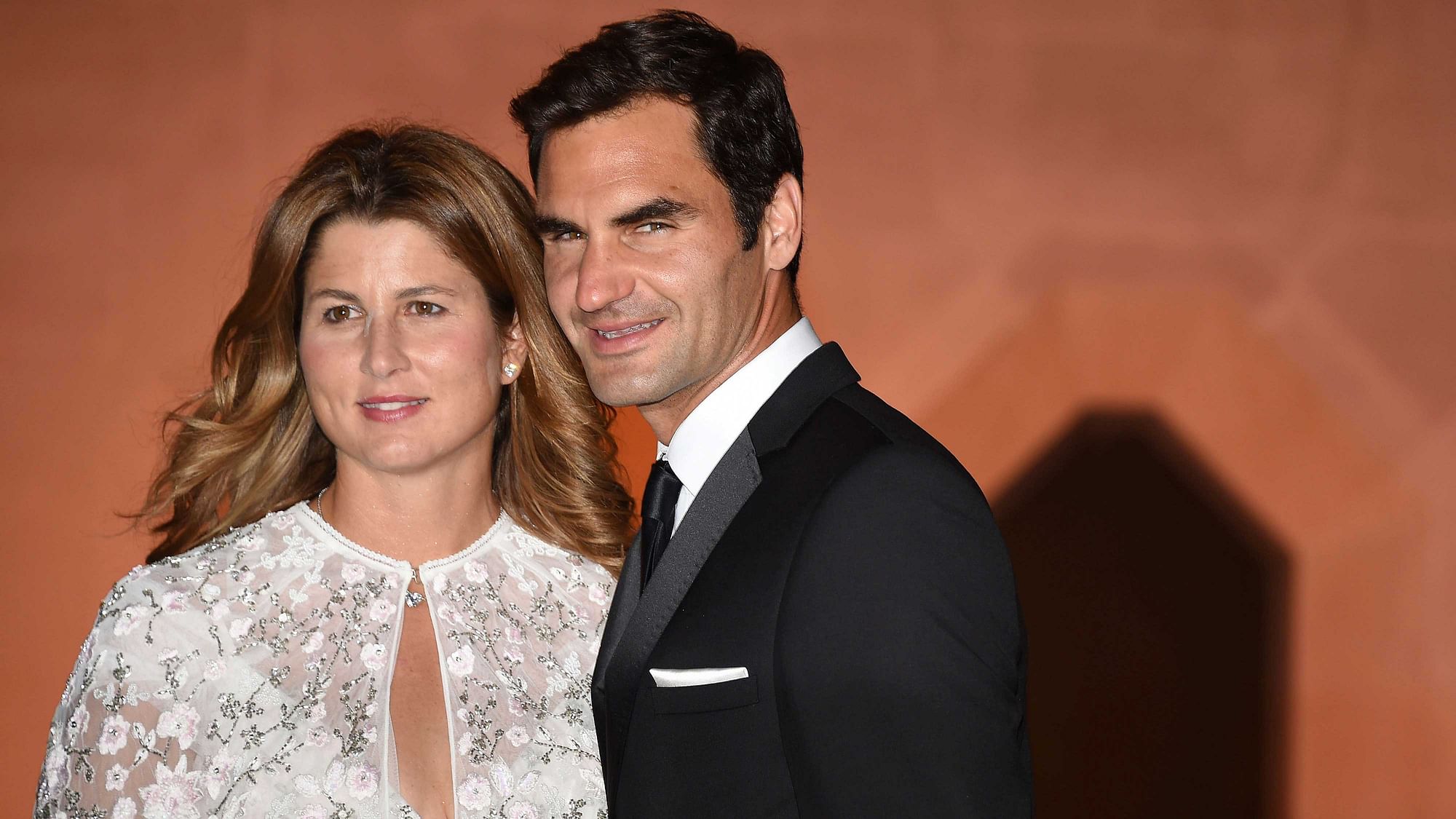 Wimbledon champion Switzerland’s Roger Federer and his wife Mirka arrive at the Wimbledon Champions Dinner
