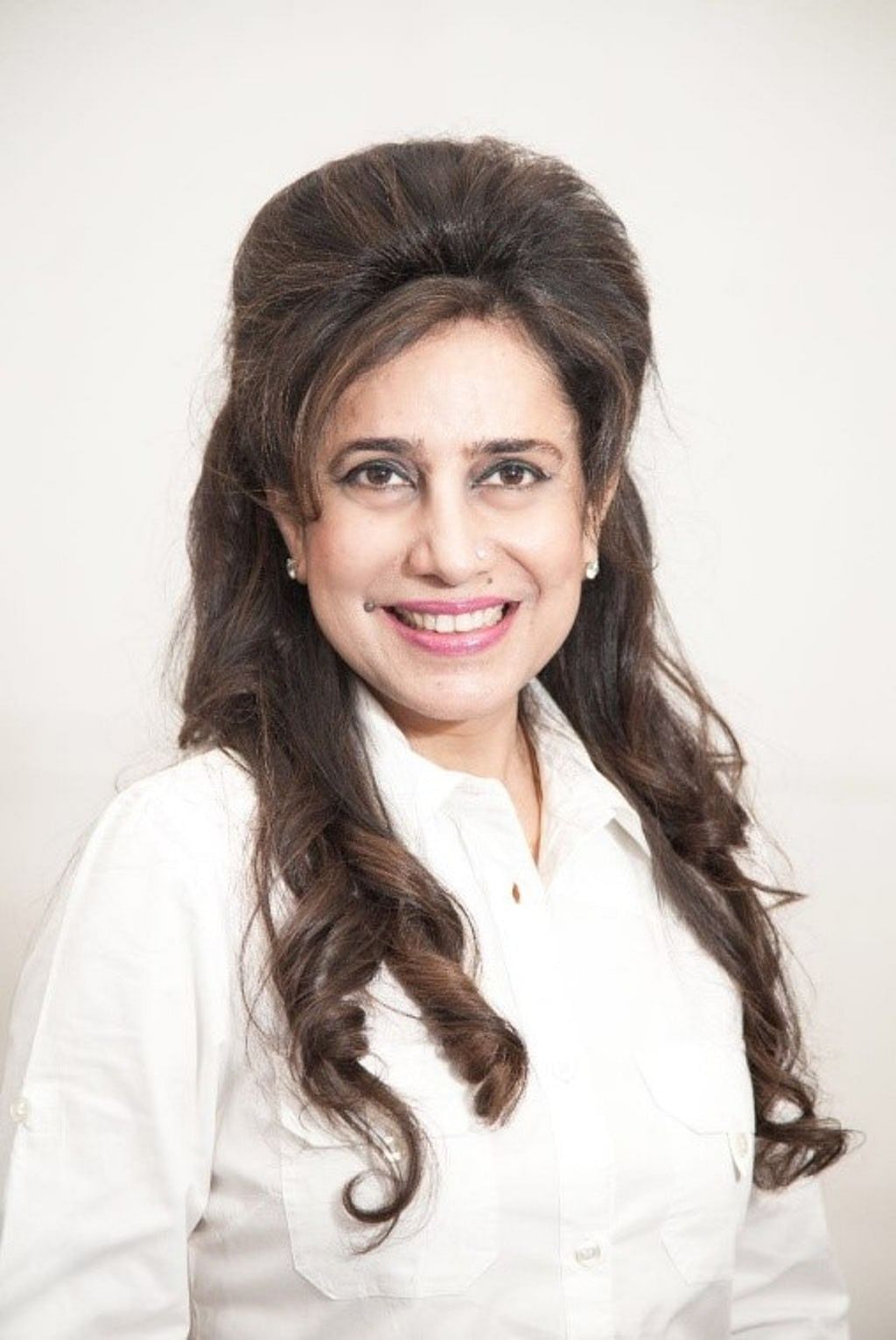 
















Suzy Singh is a Transpersonal Therapist, Karma Coach, Relationship
Counsellor and Spiritual Teacher