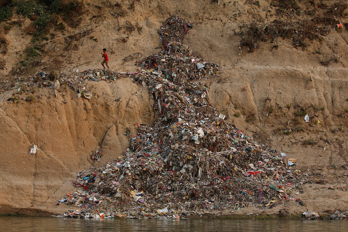 Thousands of Indians immerse themselves and idols of their gods every day in the river Ganga. 