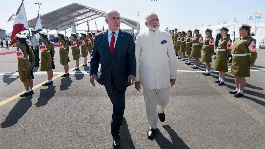 PM Modi being received by the Prime Minister of Israel, Benjamin Netanyahu, on his arrival in Tel Aviv, Israel. (Photo: PTI)