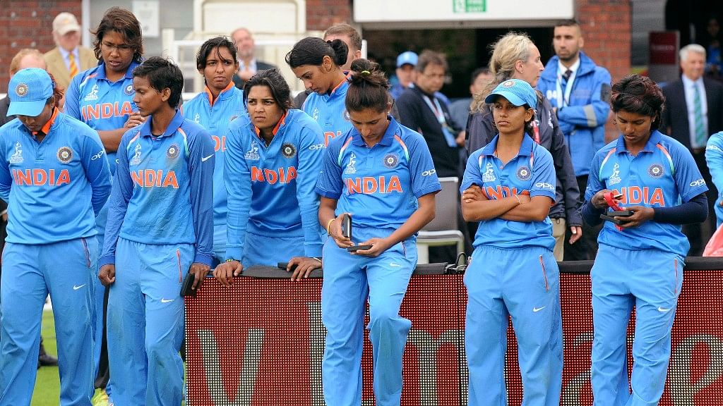 

India players stand dejected after receiving their runners-up medals after losing the ICC Women’s World Cup final match against England, at Lord’s.