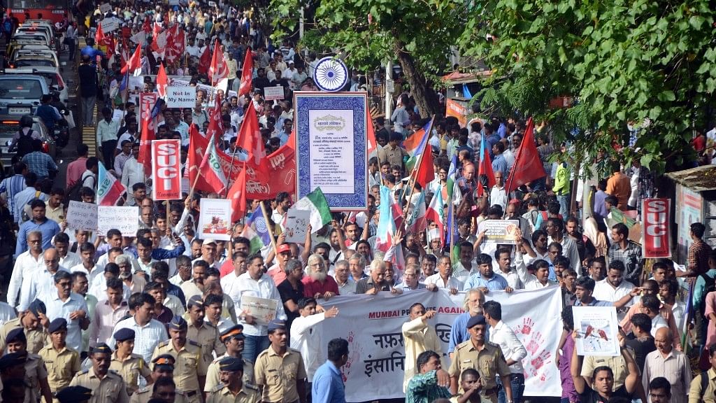 People participating in a rally against mob lynching.&nbsp;