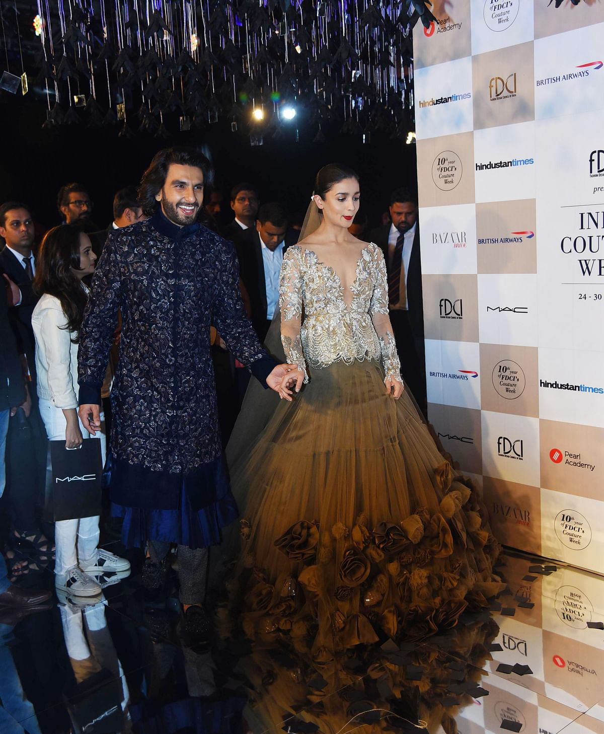 Alia Bhatt and Ranveer Singh walked the ramp for Manish Malhotra at India Couture Week.