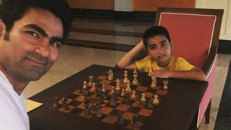Mohammad Kaif shares a picture of himself and his son playing chess on Facebook.