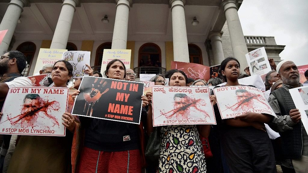 

 Citizens hold placards during a silent protest “ Not in My Name “ against the targeted lynching, in Bengaluru.&nbsp;