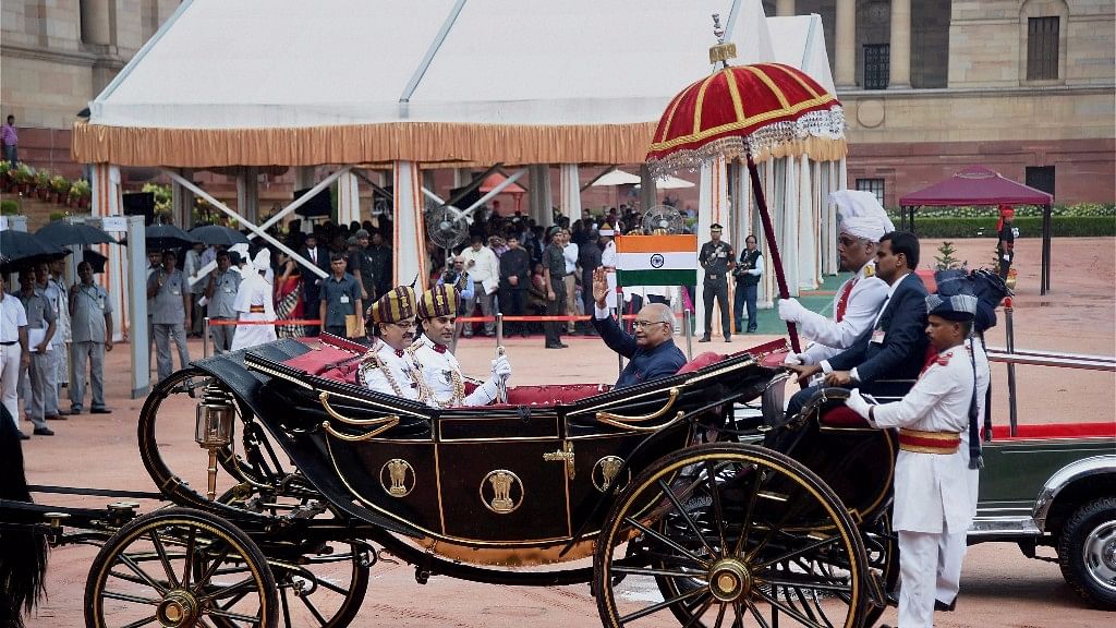 Newly elected President Ram Nath Kovind takes a ride on the royal landau at Rashtrapati Bhavan on Tuesday.&nbsp;